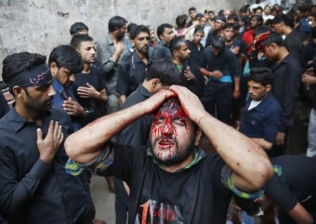 A Shia Muslim Man Gestures During A Muharram Proccession