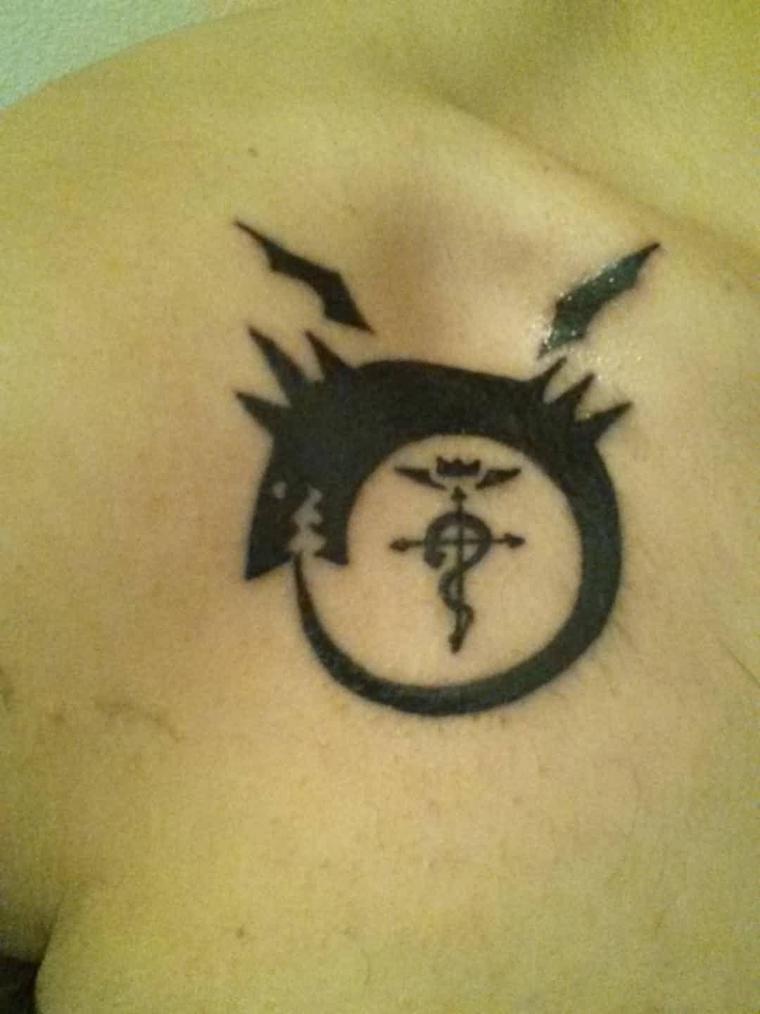 Amazing Black Ink Ouroboros Tattoo On Front Shoulder