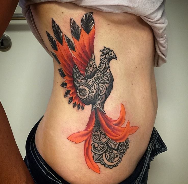 Amazing Phoenix Tattoo On Side Rib by Jozsef Torok