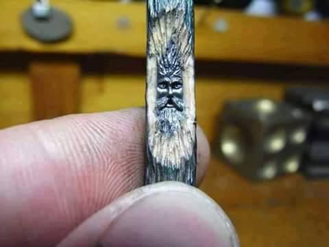 Amazing portrait crafted on side of a pencil