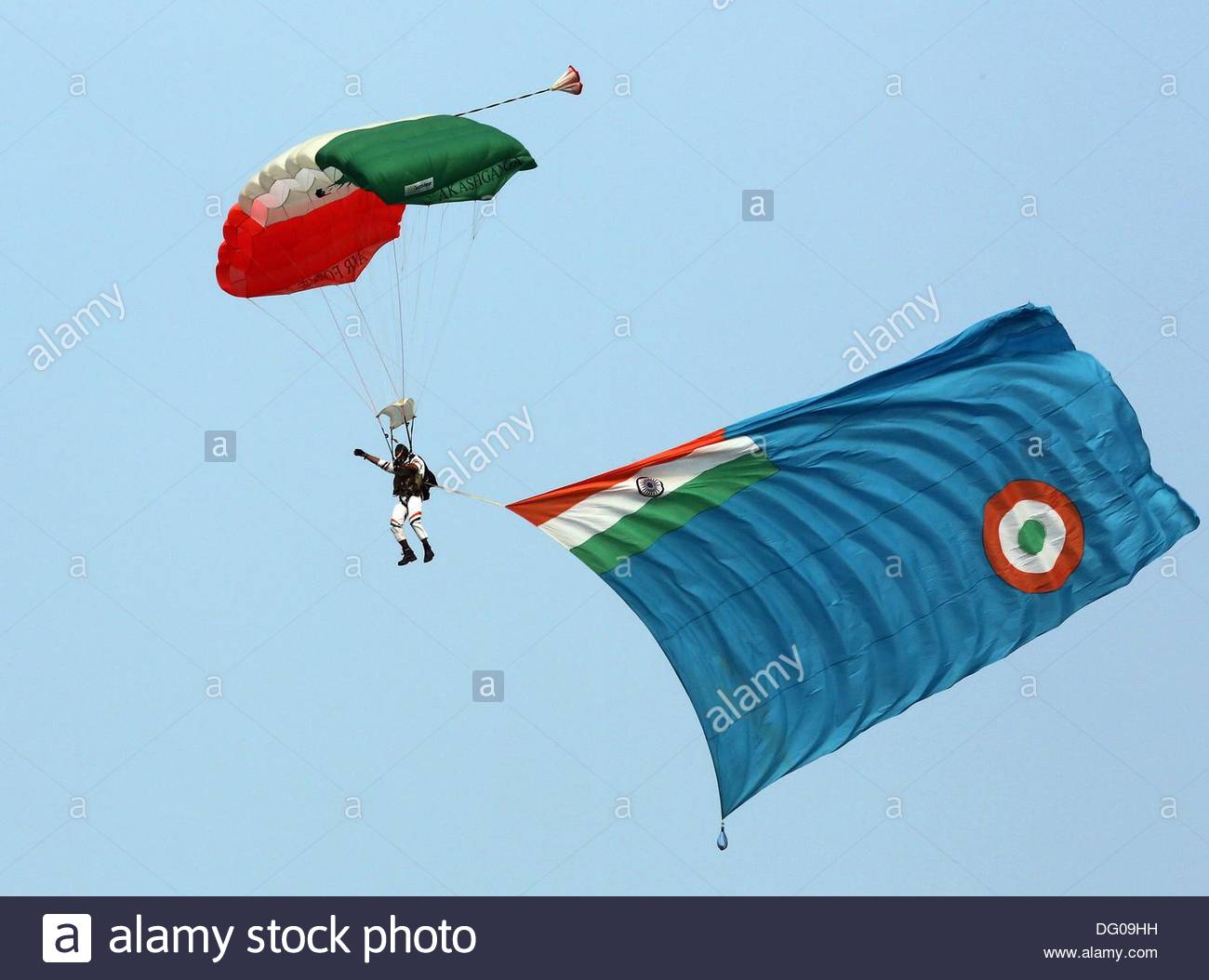 An Indian Air Force Paratrooper Performs A Jump During Air Force Day Celebrations