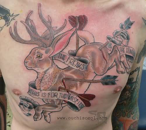 Banners And Jackalope Tattoo On Man Chest