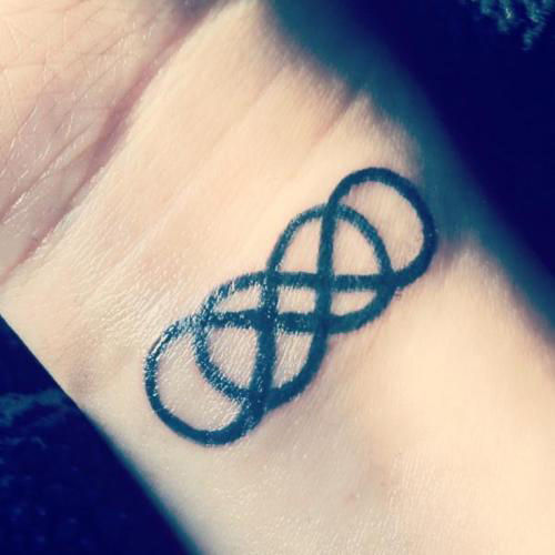 Black Ink Infinity Tattoos On Wrist