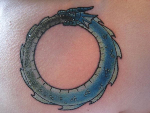 Blue Ink Ouroboros Tattoo