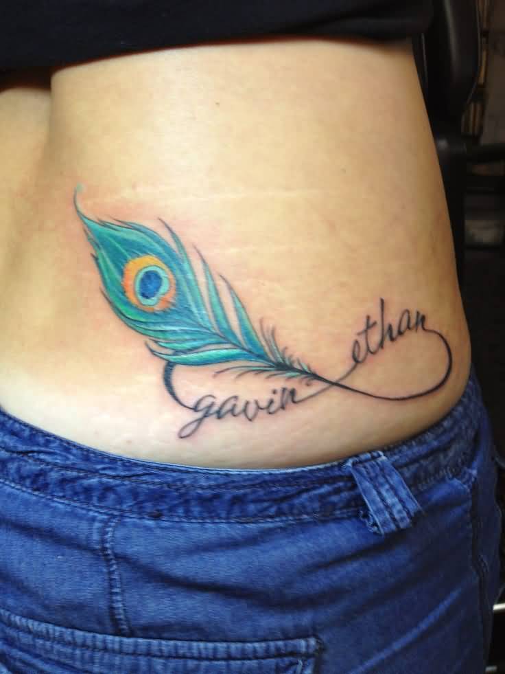 Blue Peacock Feather And Infinity Tattoo On Lower Back