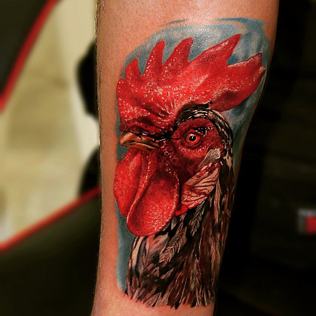 Colored Realistic Rooster Tattoo On Arm