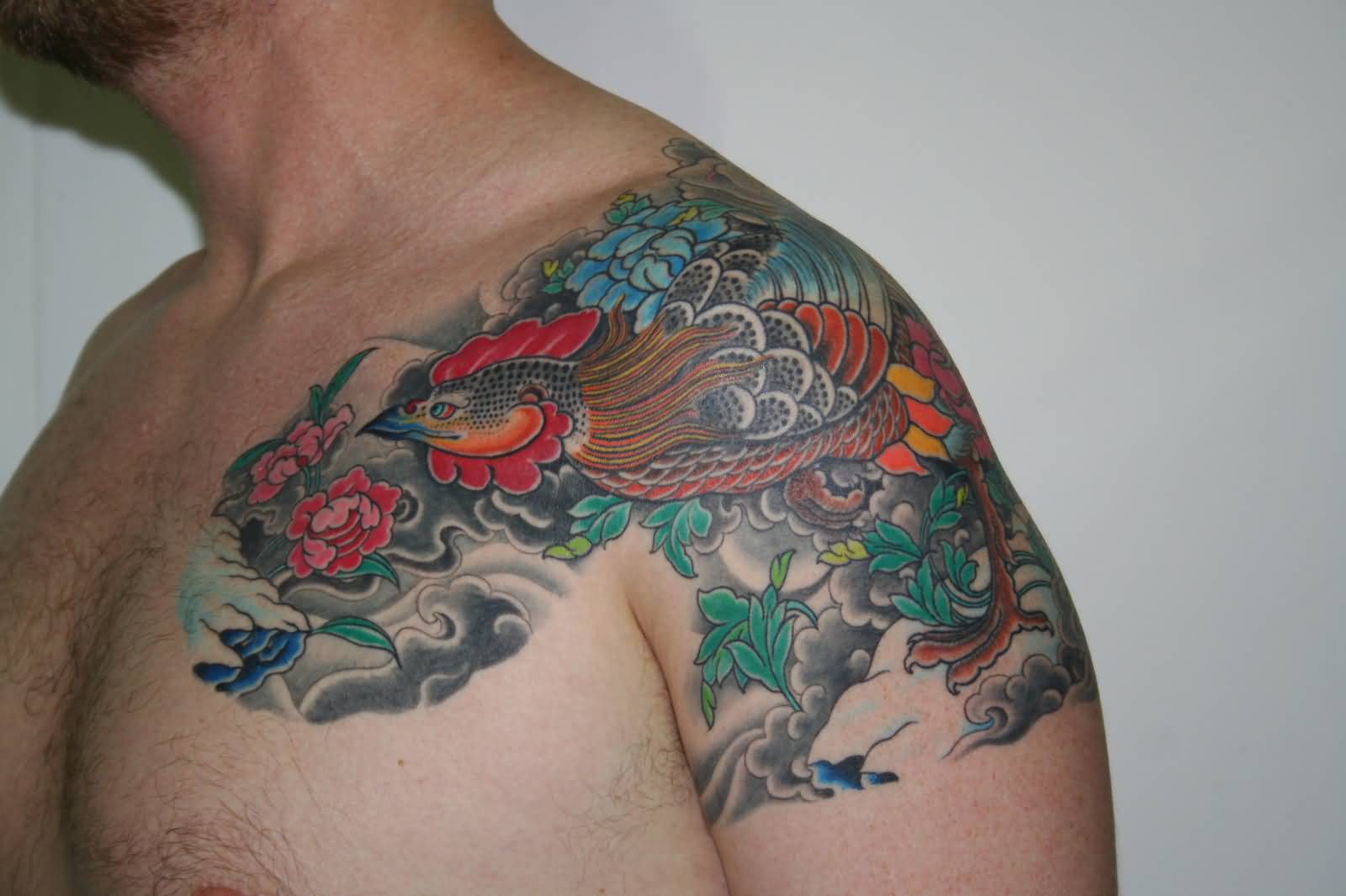 Colored Rooster Tattoo On Front Shoulder