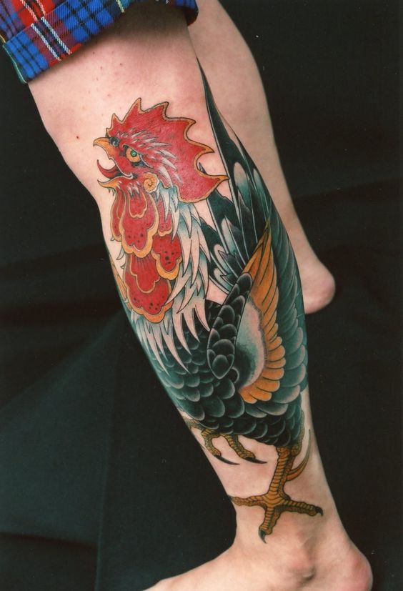 Colored Rooster Tattoo On Left Leg