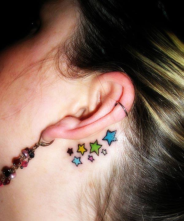 Cute Colored Stars Tattoos Behind The Ear