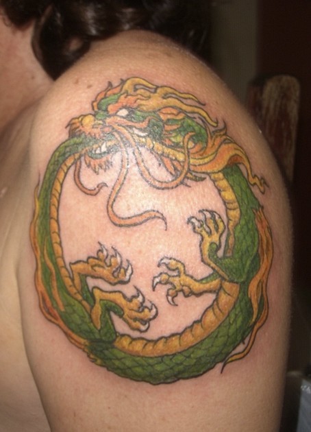 Green Asian Dragon Ouroboros Tattoo On Shoulder