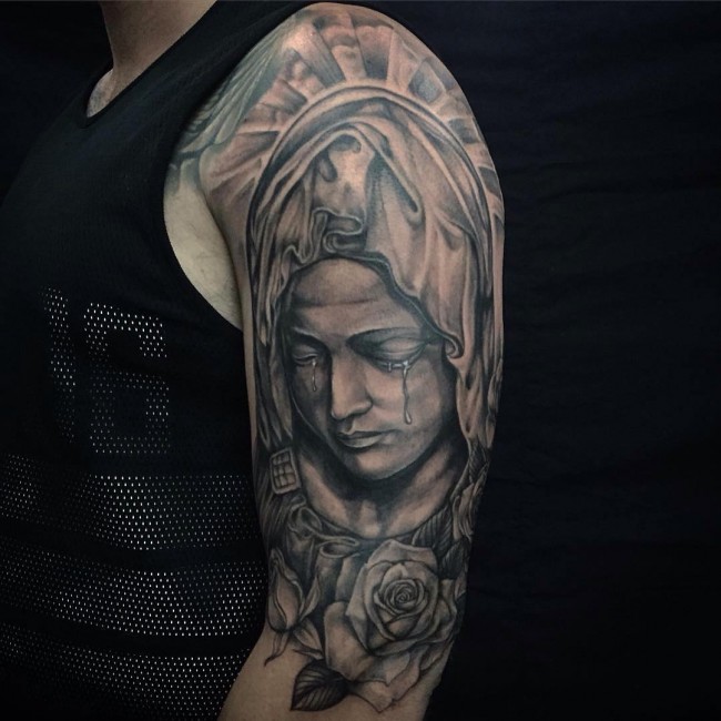 Grey Ink Crying Virgin Mary Tattoo On Left Half Sleeve