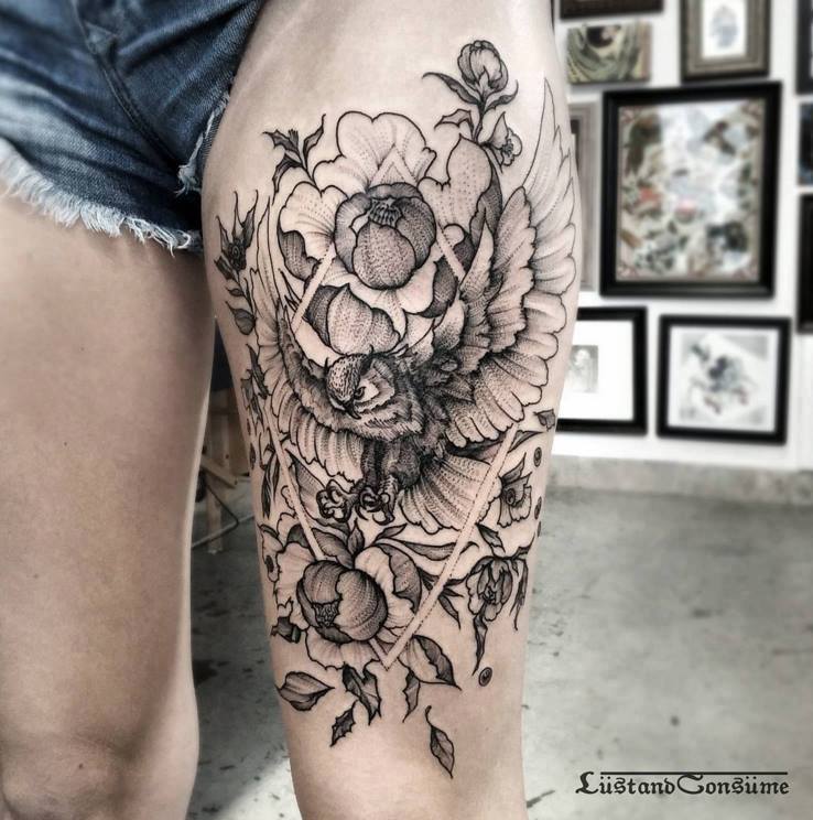 Grey Ink Hibiscus Flowers And Flying Owl Tattoo On Left Thigh