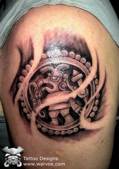 Grey Ink Mayan Tattoo On Left Shoulder