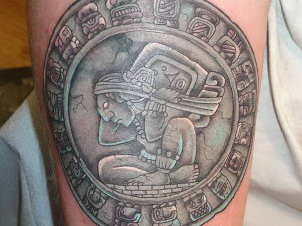 Grey Ink Mayan Tattoo On Leg