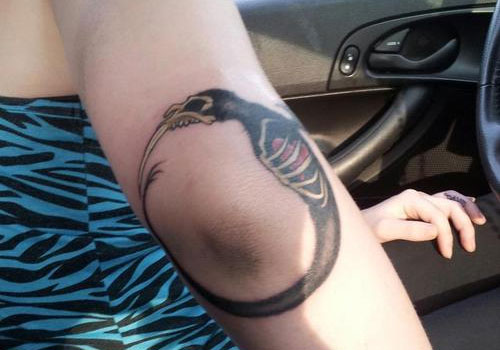 Grey Ink Right Elbow Ouroboros Tattoo