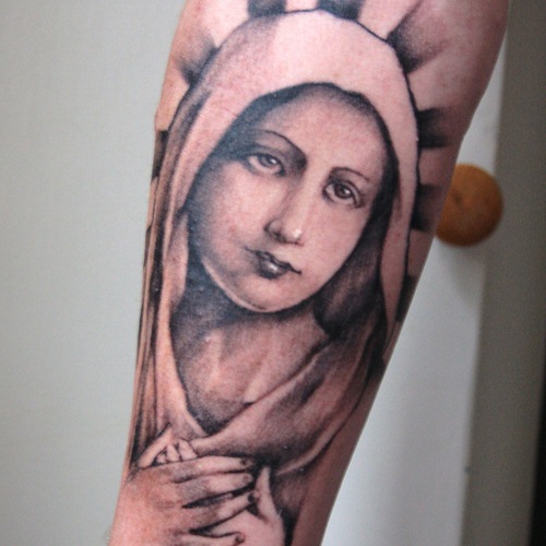Grey Ink Virgin Mary Tattoo On Sleeve