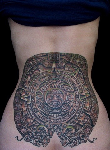Grey Mayan Tattoo On Girl Lower Back