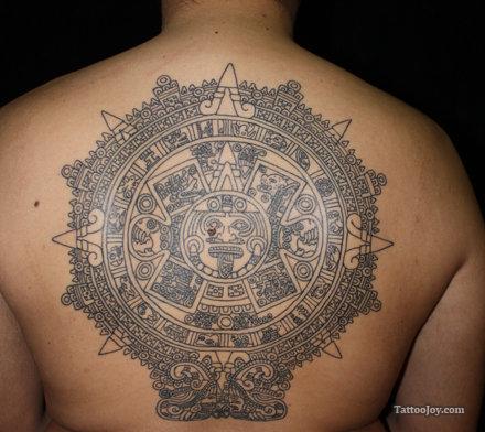 Grey Mayan Tattoo On Upper Back