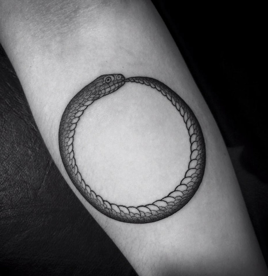 Grey Ouroboros Symbol Tattoo On Forearm