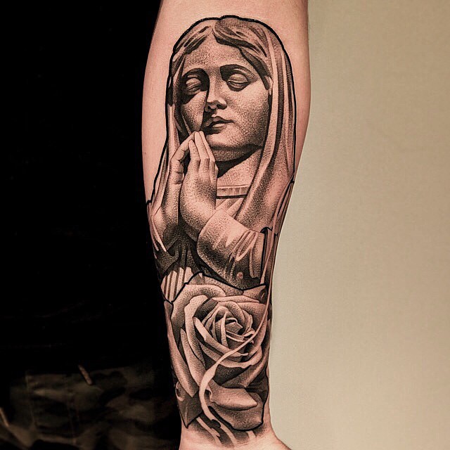 Grey Rose Flower And Virgin Mary Tattoo On Forearm