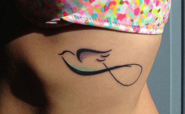 Infinity Bird Tattoo On Girl Side Rib