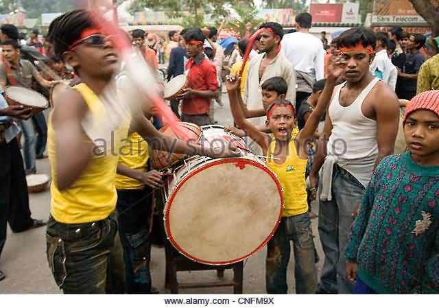 Kid Drummer During The Annual Celebration Of Muslim Festival Of Muharram In Bangladesh