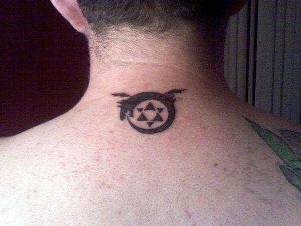 Man Upper Back Small Ouroboros Tattoo