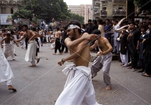 Men Beating Themselves During The Muharram Celebrations In Krachi, Pakistan