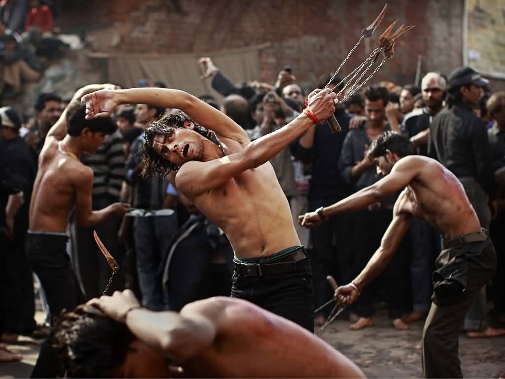 Muslim Men Cutting Body During Muharram Celebration