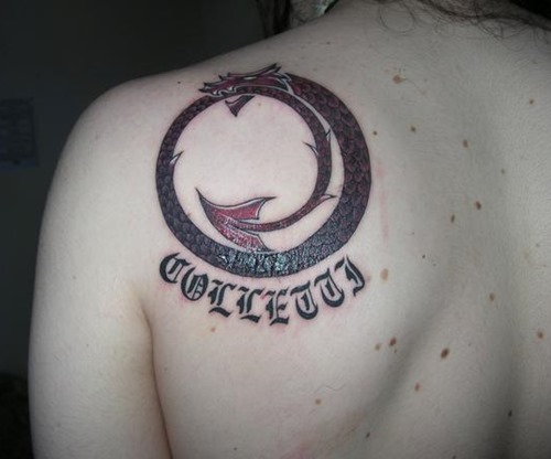 Nice Ouroboros Tattoo On Left Back Shoulder