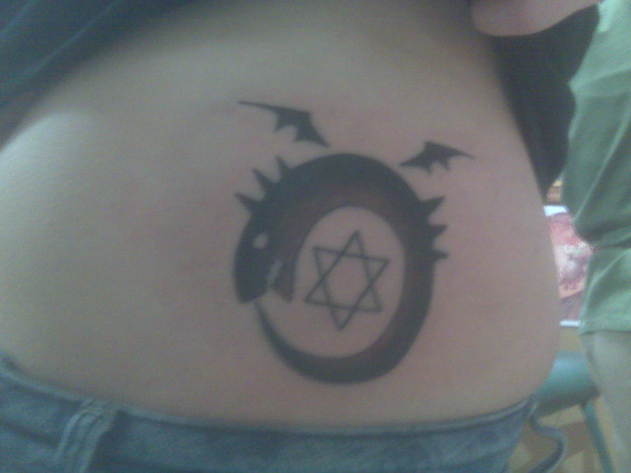Ouroboros Tattoo On Lower Back by Misslaneyluck