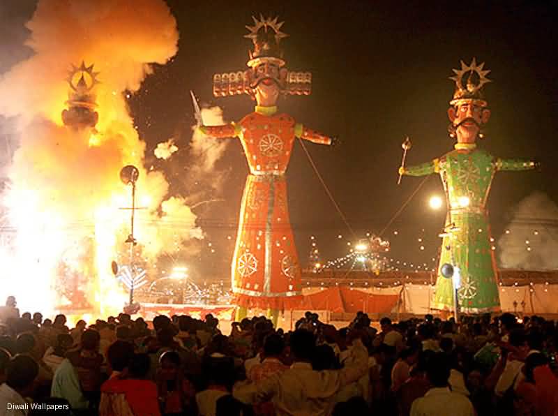 People Enjoying The View Of Burning Effigies Of Ravana, Kumnhkaran And Meghnath During Dussehra Celebration