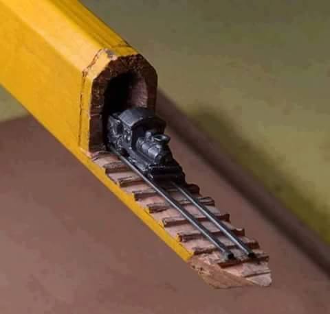 Railway Engine with track created inside a pencil