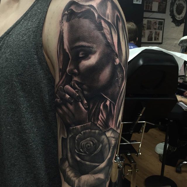 Realistic Dark Ink Virgin Mary Tattoo On Half Sleeve
