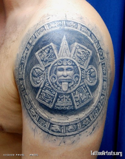 Realistic Grey Mayan Tattoo On Man Left Shoulder