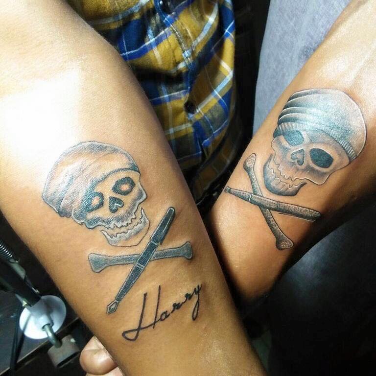 Skull Tattoos on forearms