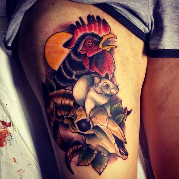 Squirrel And Rooster Tattoo On Thigh