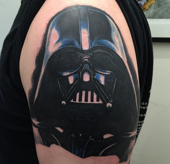 Black And Blue Darth Vader Tattoo On Left Shoulder