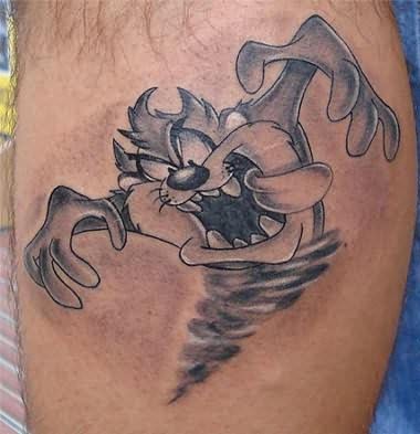 Black And Grey Baby Taz Tattoo On Leg