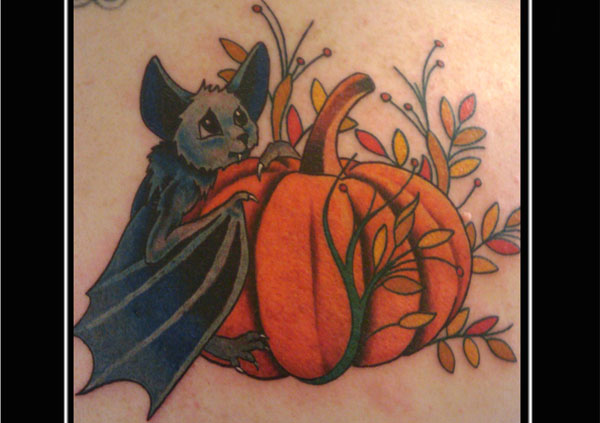 Black And Grey Bat And Pumpkin Tattoo
