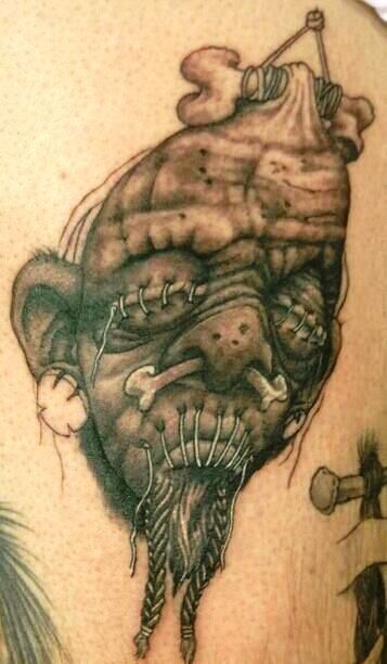 Black And Grey Shrunken Head Tattoo by Mike Clave