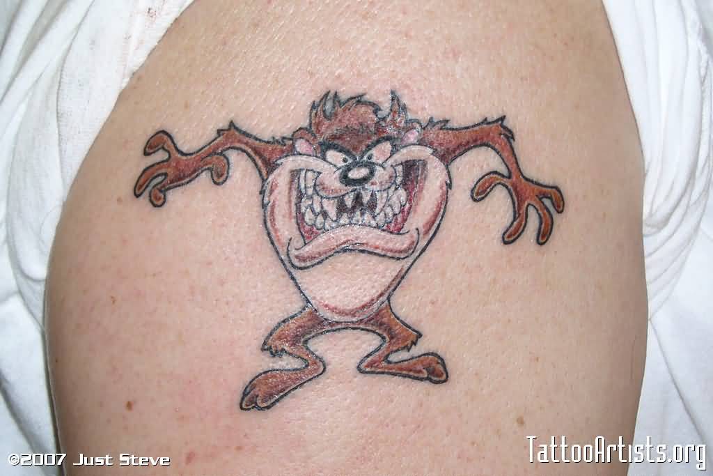 Brown Ink Taz Tattoo On Shoulder For Men