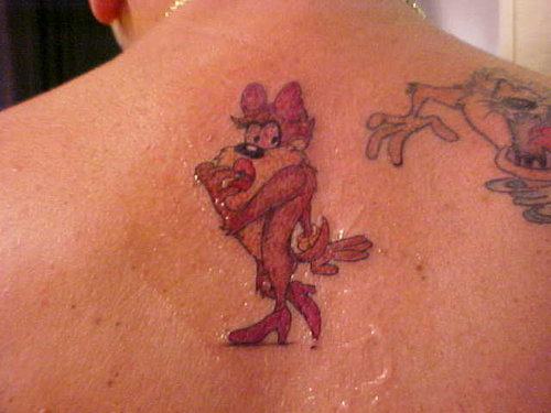 Cutie Taz Dog Girl Tattoo On Upper Back