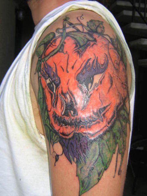 Evil Pumpkin Tattoo On Left Shoulder For Men