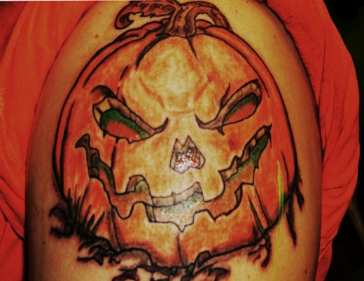 Evil Pumpkin Tattoo On Shoulder