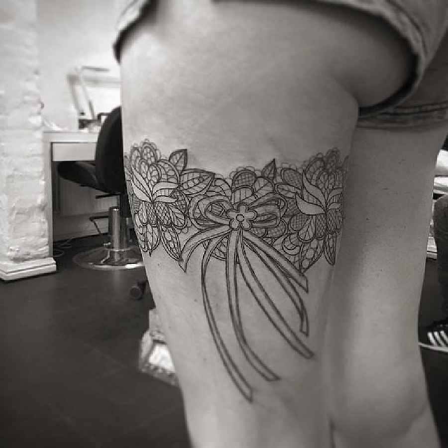 Floral Garter Tattoo On Left Thigh For Girls