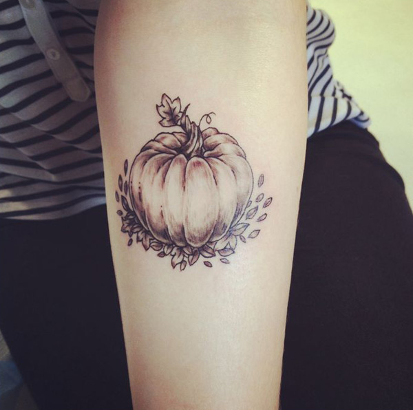 Grey Ink Cute Pumpkin Tattoo On Left Forearm
