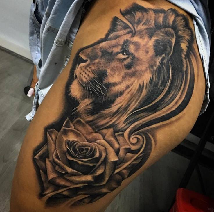Grey Rose And Lion Head Tattoo On Side Thigh by Angry Mom Tattoo Studio