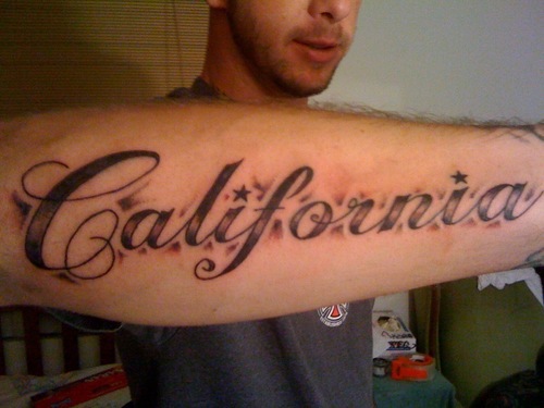 Guy Showing California Tattoo On Arm