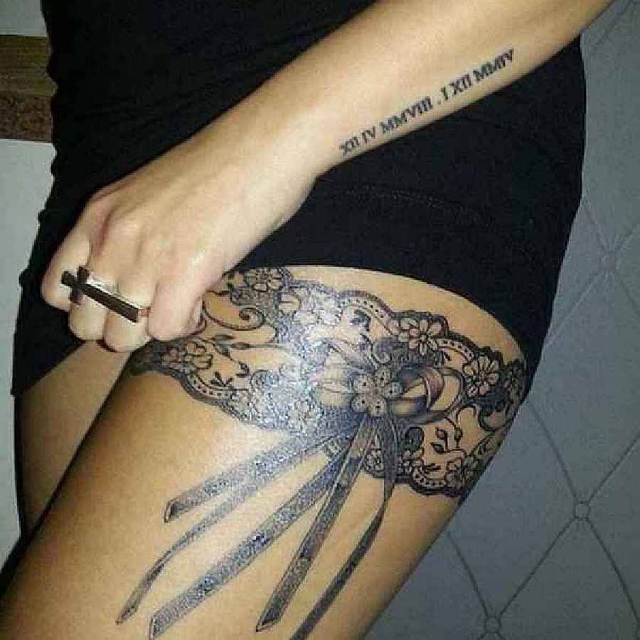 Lace Garter Tattoo On Girl Left Thigh